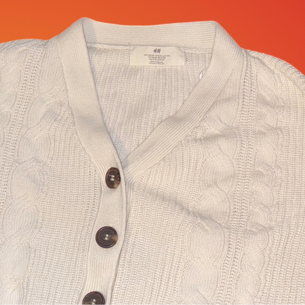 Promotion of three H&M women's sweaters